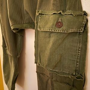 Crafted from one of a kind vintage military uniforms— good condition!